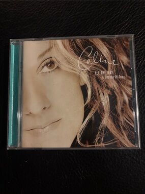 Celine Dion- Beige Cover with Turquoise Spine CD